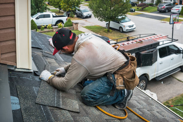 Professional Roofing technician working in Broomfield, CO
